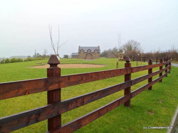 Cresoted Timber Fence with Special Top Timber Posts