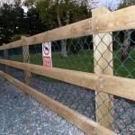 3-Rail Timber Fence with green PVC chain link