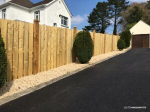 Round top timber panel fence