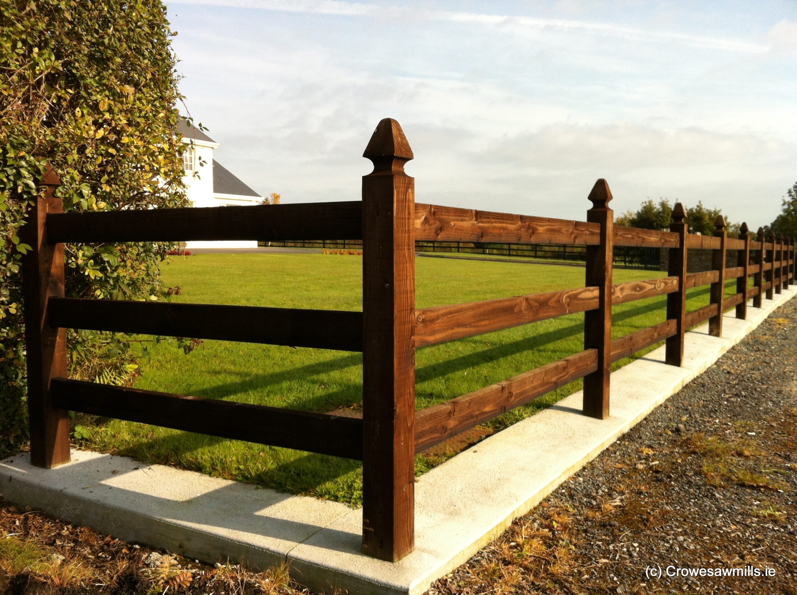 Cresoted Timber Fence with Special Top Timber Posts